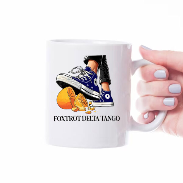 Foxtrot Delta Tango, Chuck Stepping On Hat Mug