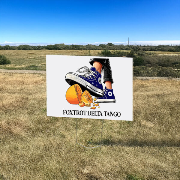 Foxtrot Delta Tango, Chuck Stepping On Hat Yard Sign