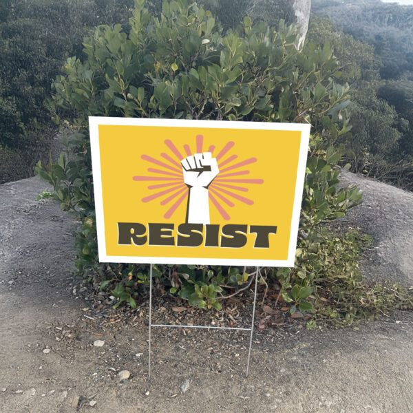 Resist protest sign with burst and raised fist