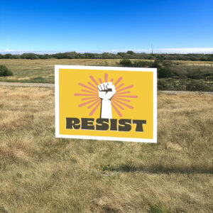 Resist protest sign with burst and raised fist